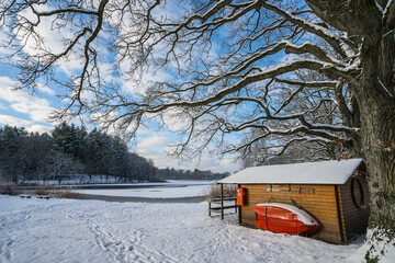 snow covered cabin in winter