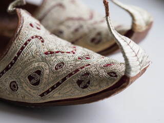 close up spiky handmade turkish leather shoes and delicate embroidery