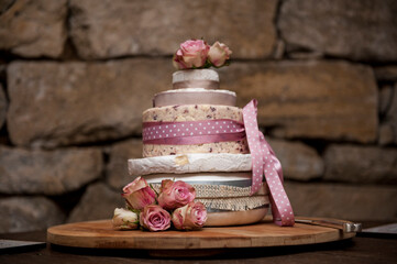 Wedding cheese cake with pink flowers