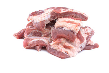 Raw pork ribs are isolated on a white background.