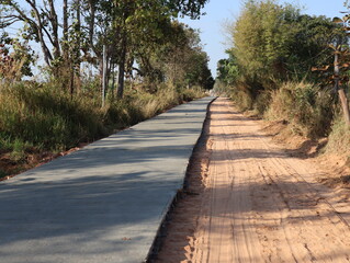 A concrete road in the countryside under construction