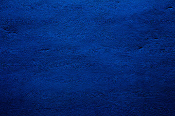 Blue colored abstract wall background with textures of different shades of blue