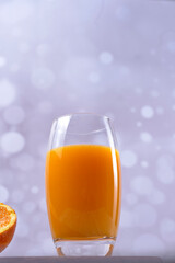 Orange juice on wooden table