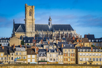 View on the gothic St Cyr Ste Juliette cathedral and the city of Nevers from the Loire River bridge