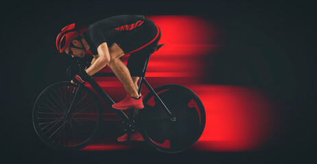 Man racing cyclist on black background. Matte image