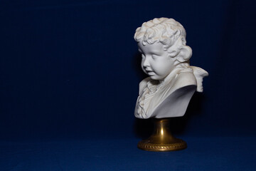 Obraz premium plaster head, mock up for drawing, blue background, human body 
