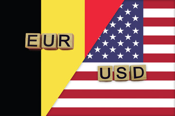 Belgium and USA currencies codes on national flags background