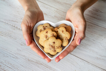 Festive ginger cookies with cinnamon in the shape of hearts