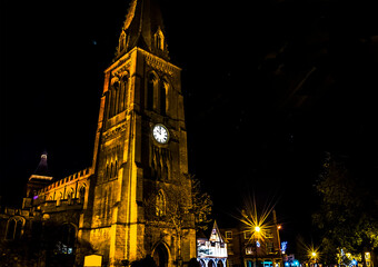 Fototapeta premium A view past the old church towards the square in Market Harborough, UK on a winters night