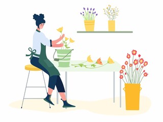 Woman compose bouquet on table. Forist shop or store.