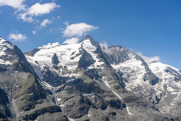 Snowy top of Grossglockner mountain summit in Austria summer afternoon