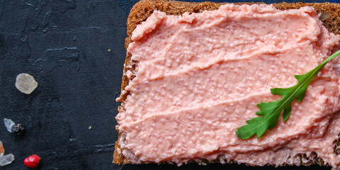 Smorrebrod sandwich seafood capelin caviar and salted salmon or rillettes fish on the table meal snack top view copy space for text food background image pescetarian diet