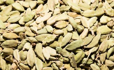 dry green cardamon close uo background texture