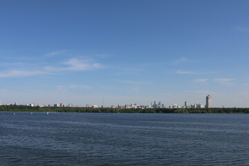 Houses in Strogino on the background of the river, Moscow.
