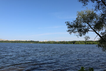 Houses in Strogino on the background of the river, Moscow.
