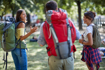 Group of three travellers sightseeing