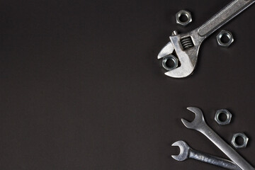 Set of wrenches on a black background
