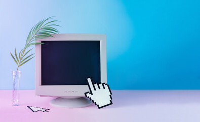 Retro vintage computer monitor with tropical palm leaf. Blue and purple colored lights. Creative...
