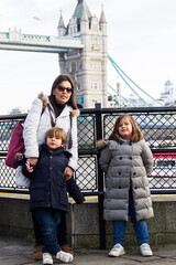 family portrait next to the tower of london