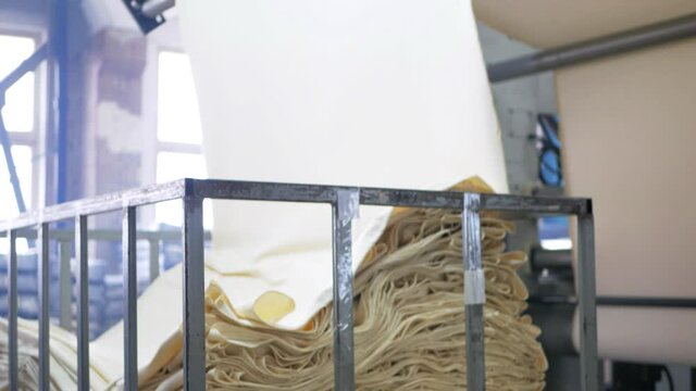 Fabrication and dyeing of fabric at the factory. Textile factory industry.