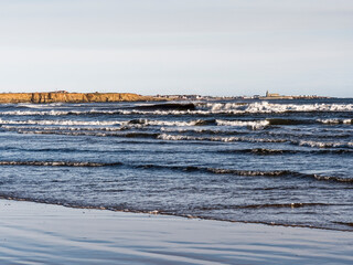 Coastal scene with cliffs and waves