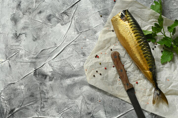 Smoked mackerel fish, on gray background, top view flat lay