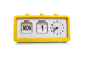 Retro electronic alarm clock and analog flip calendar. Retro design from 60s 70s home interior. Bright yellow color.