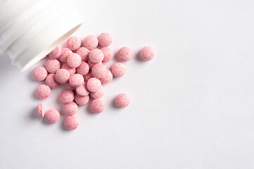 Vitamin B 12 Supplements Spilled from a Bottle