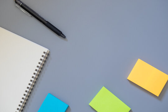 High Angle View Of Yellow And Book On Table