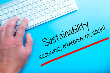 Sustainability  economic, environment, social Sign Working at home with computer man writing. Man...