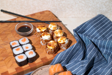 Sushi set and chopsticks on napkin