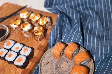 Sushi set and chopsticks on napkin. Sushi background. Asian or Japanese food