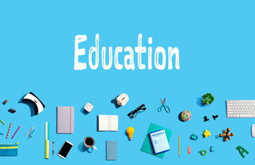 Education concept with collection of electronic gadgets and office supplies
