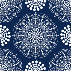 Vector seamless pattern with dot mandalas. Aboriginal style of dot painting