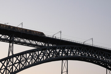 Backlit D. Luis bridge at dawn