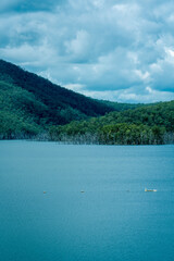 Obraz premium The Hinze Dam is a rock and earth-fill embankment dam with an un-gated spillway across the Nerang River in the Gold Coast hinterland of South East, Queensland, Australia.