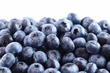 fresh blueberries on a white background, sweet berries