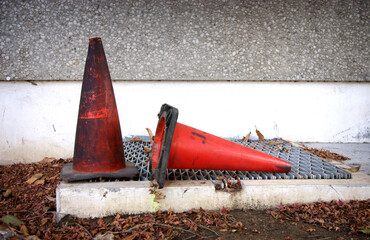Old and worn safety cones