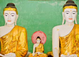 Shwedagon Pagoda three Budha statue