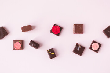 Fototapeta na wymiar Luxury Valentine's Chocolate on Pink Background 