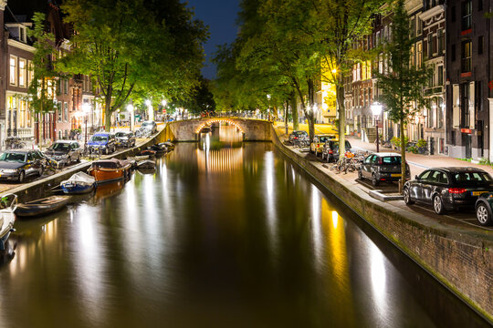 Bridge Over Canal In City At Night © josé gouveia/EyeEm