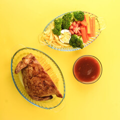 Ayam Kodok Setengah, Half Stuffed Whole Chicken with Meat Inside. Served with Steamed vegetable and Mushroom Sauce