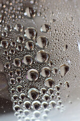 Water drops macro from a plastic bottle modern background high quality prints fifty megapixels