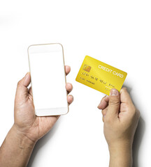 Person is holding a mobile phone in his left hand and right hand is holding a gold credit card, Isolated on white background and clipping path.