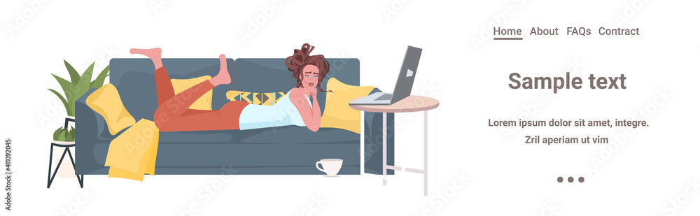 Poster woman lying on sofa using laptop online communication social networking remote work self isolation c