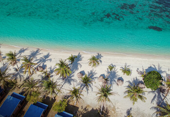 An aerial view of the white sand beach with the crystal clear beach water in Koh Lipe, island, Thailand.