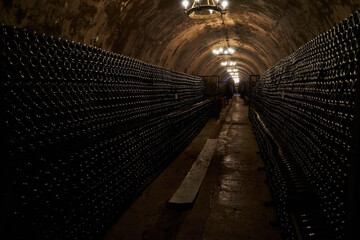 An image of an underground tunnel for aging wine.