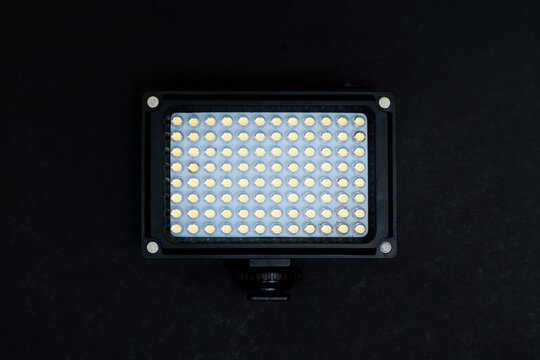 Portable LED lights for photography and night outdoor activity. Battery powered and made of plastic material. Isolated on black background.