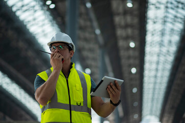 worker using radio communication with helmet