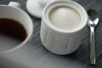 Black tea with sugar cubes